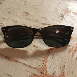 Ray-Ban Wayfarers.